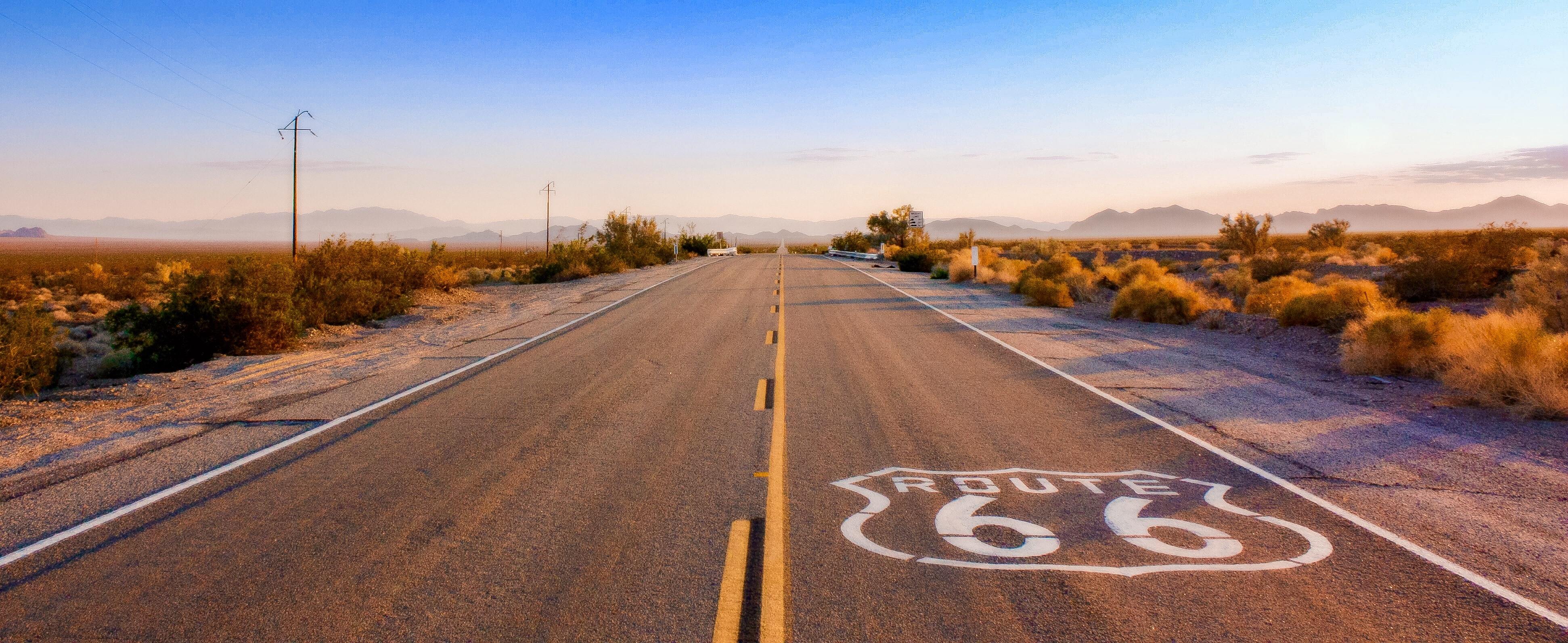 empty road on Route 66 with route 66 logo