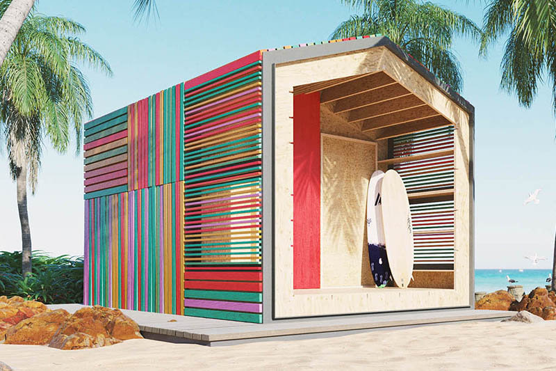 modular cabin on the beach with rainbow stripes