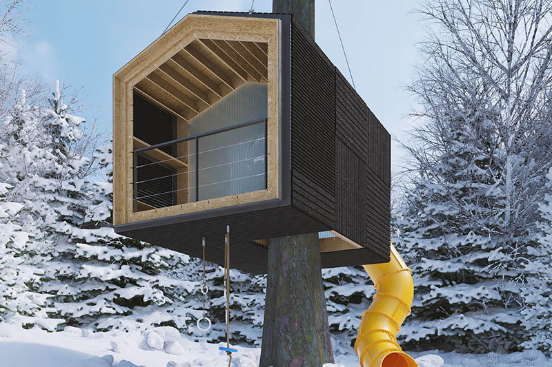 modular cabin treehouse in the snow with slide