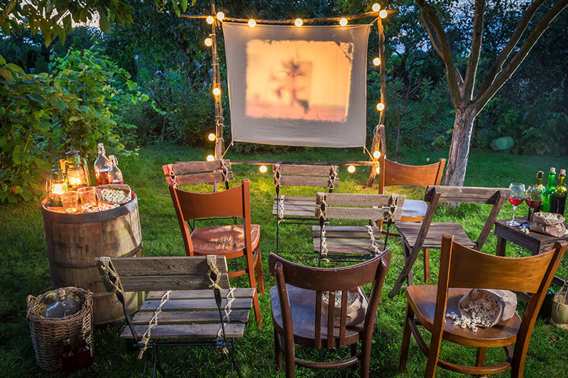 outdoor movie theater set up with projector
