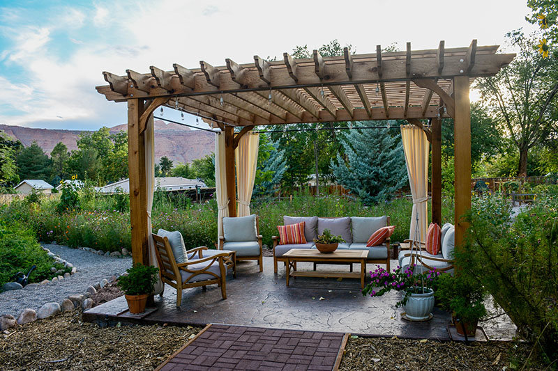 outdoor pergola with patio furniture